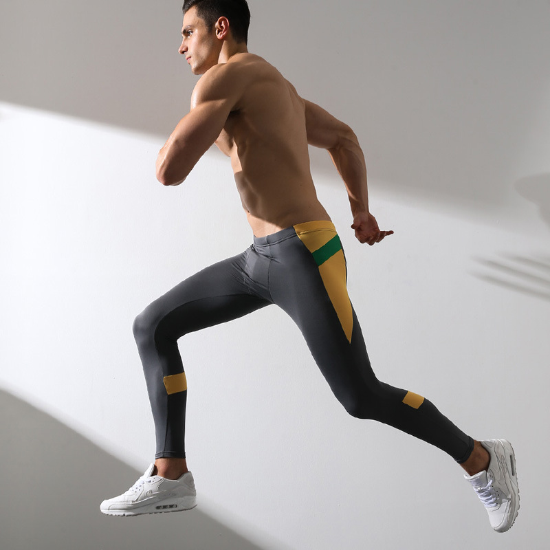 Quần nam mùa thu Quần skinny Tide Quần legging nam thấp Eo gợi cảm Màu mỏng phù hợp với quần ấm Quần quần giữ nhiệt trẻ em
