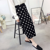 Counter 2021 autumn and winter new black wave point knitted skirt women's long Korean fashion slim hip skirt