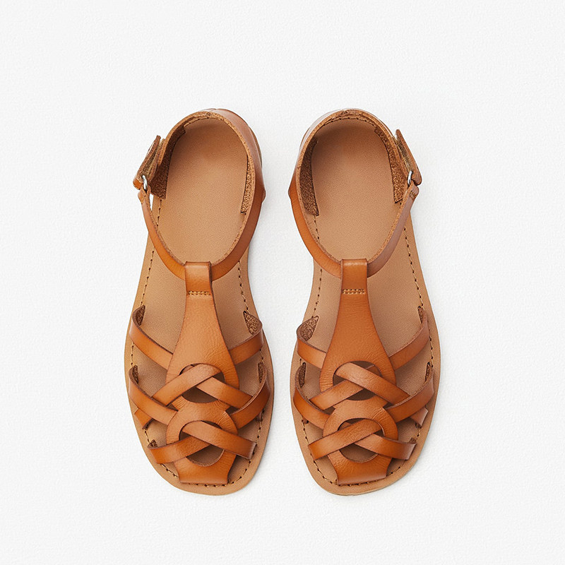 2021 Summer new Rome flat bottom sandal women Baotou Woven Cross Belt Hollowed-out Single Shoes Fairy Za Women Shoes Ra