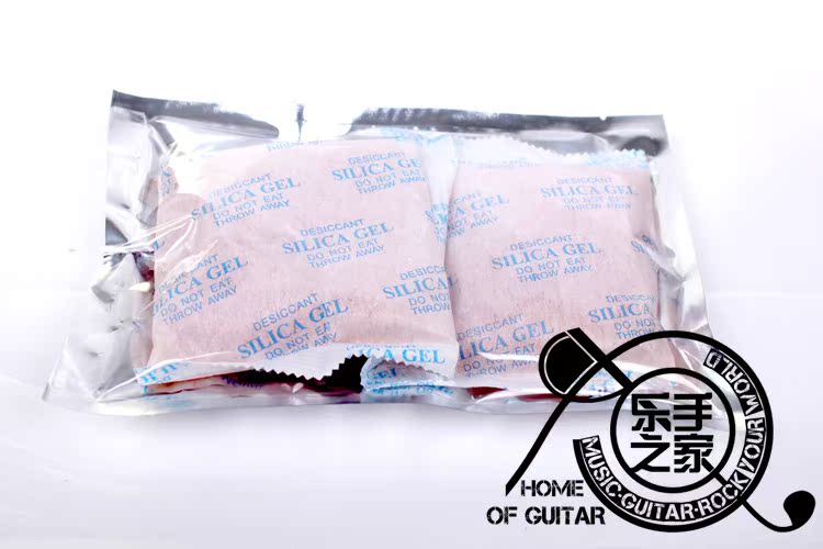 Guitar Desiccant 100G chuyên dụng 2 bao bì kín Đảm bảo hộp nhạc cụ tươi Máy ảnh hút ẩm - Phụ kiện nhạc cụ bộ dây đàn guitar classic