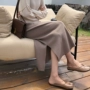 A7seven eo cao thon gọn váy dệt kim nữ mùa thu và đông mới phiên bản Hàn Quốc của túi đeo hông hoang dã bước váy chân váy 2 tầng