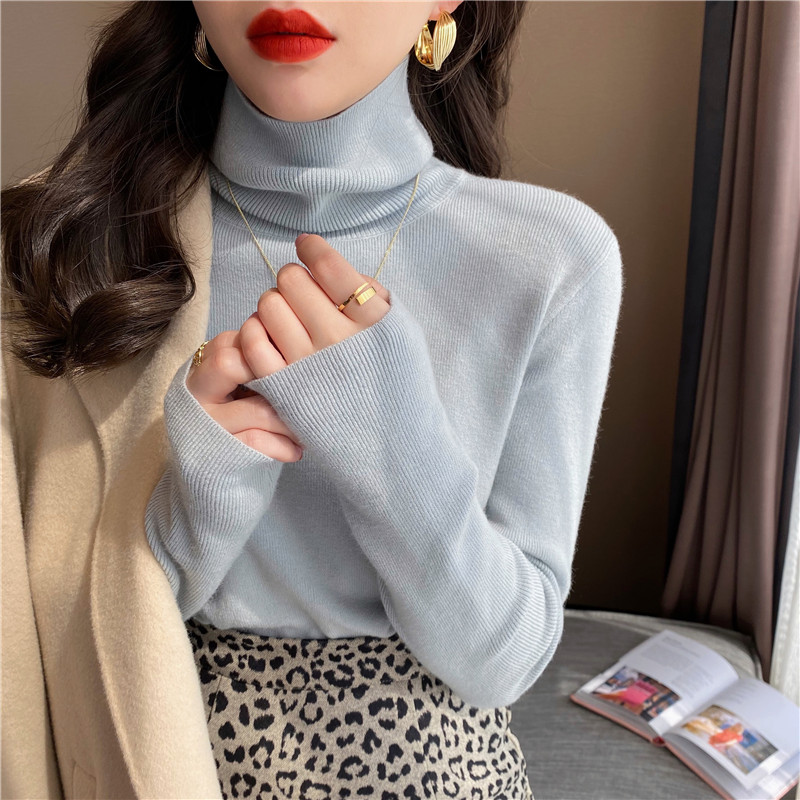 High-neck sweater women's autumn and winter high-end white bottoming shirt fashion foreign style piled collar black knitted top