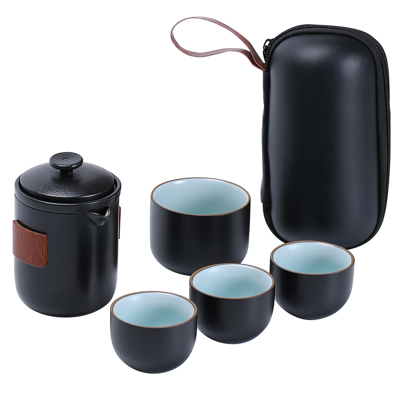 Black pottery travel kung fu tea set a pot of ink words four cups of portable ceramic crack cup small set of tea cups trill