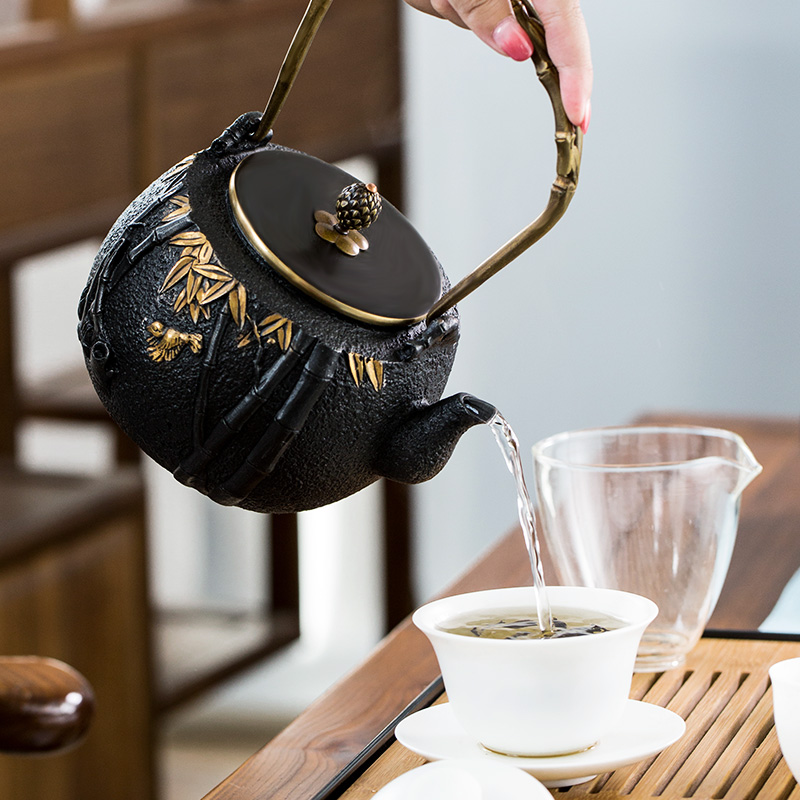 Gold cast iron pot of boiled tea kettle manual imitation Japan tea stove teapot the boiled tea, the electric TaoLu suit household