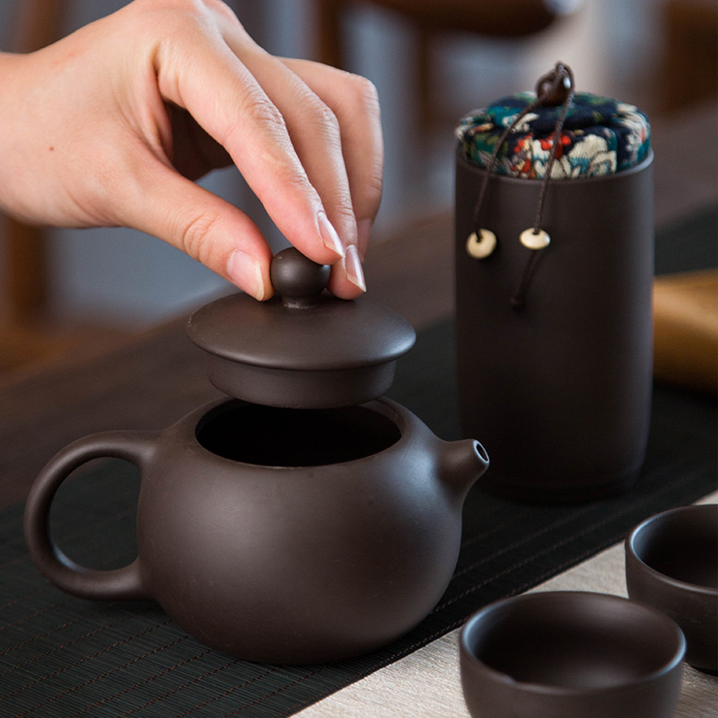 Violet arenaceous a pot of four cups of portable package travel tea set is suing crack cup travel xi shi pot of tea cups