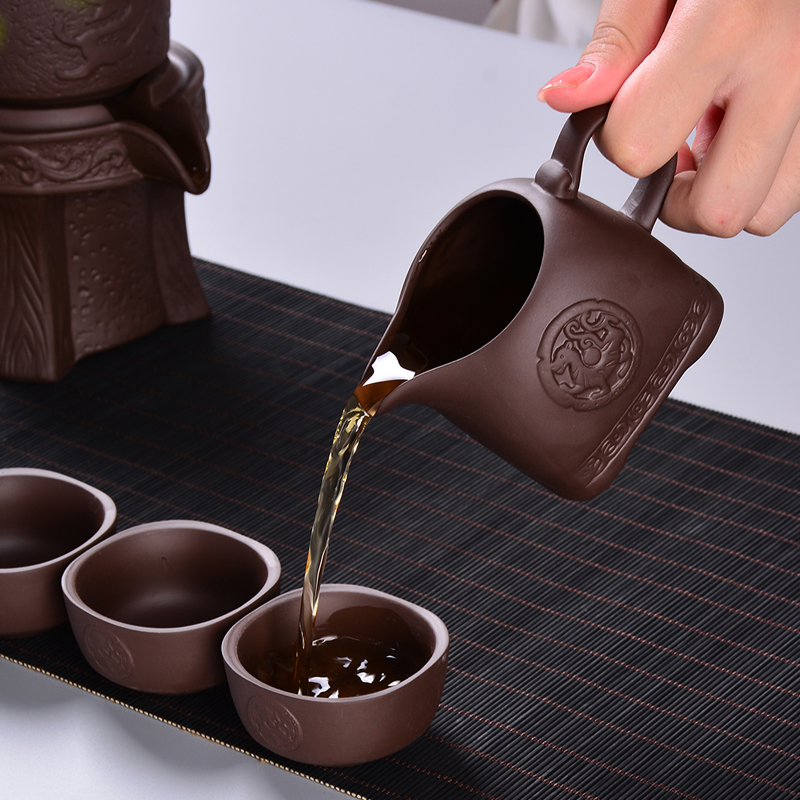 Creative stone mill violet arenaceous kung fu tea set automatically suit household lazy half of a complete set of whole teapot cup fortunes