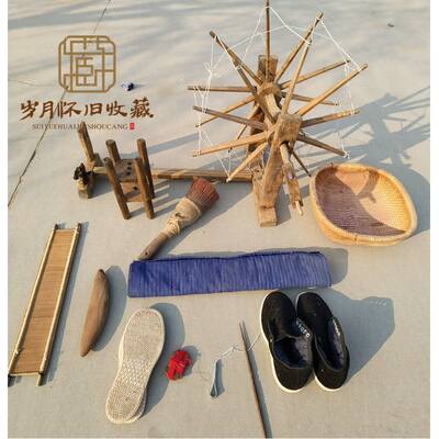 Collection of folk old items such as looms, old spinning wheels, coarse cloth tools and accessories, spinning spindles, grates, brushes and shuttles