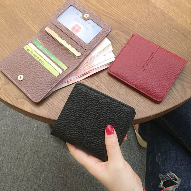 Korean version of short small wallet women's 2021 new leather wallet fashion buckle 20% card soft cow wallet simple