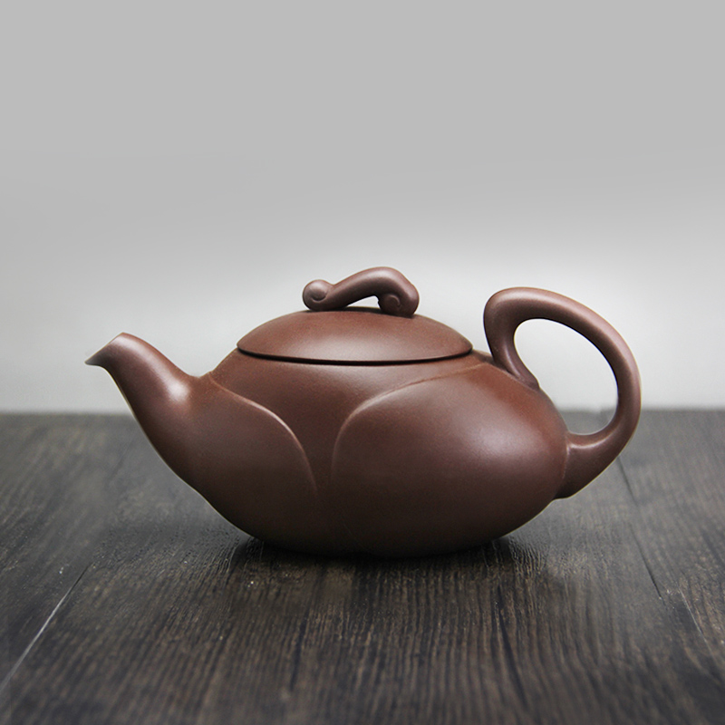 Tianfu Tea Tea Purple Sand is a pot of Yixing Purple mud elegantly designed to brew tea set