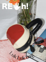 Pick up the original Rehi LukLuk small pumpkin bag niche design bag shoulder armpit shell bag