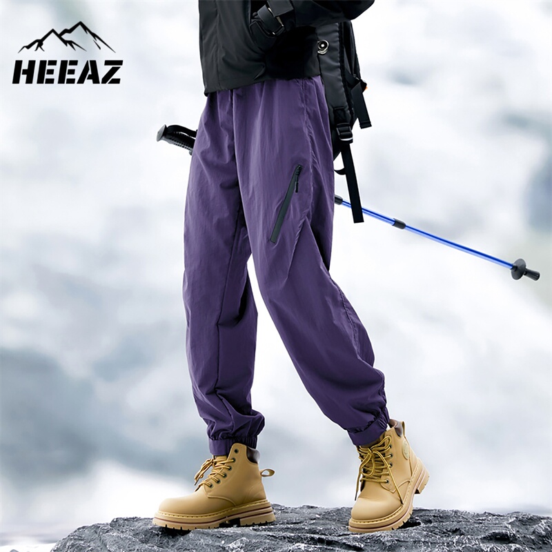 Heeaz France Travel Outdoor Softshell Pants Sports Hiking Cargo Pants Unisex Loose Waterproof Mountaineering Pants Heeaz France Travel Outdoor Softshell Pants Sports Hiking Cargo Pants Unisex Loose Waterproof Mountaineering Pants
