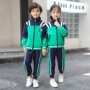 Quần áo sân vườn mẫu giáo mùa xuân và mùa thu phù hợp với trang phục thể thao trường tiểu học đồng phục nhóm dịch vụ mua quần áo trẻ em tùy chỉnh bông gió đại học đồ cho bé gái