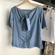 Behind the beauty and beauty of the back ~ the tight filament butterfly knot fork band loose hollow sleeved cowboy coat woman