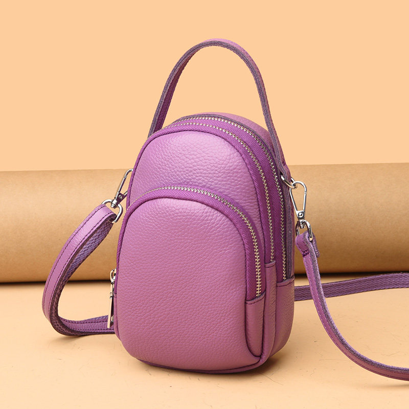 Real Cow Leather Mobile Phone Bag Mini Small Bag Bag Woman Skew Satchel Genuine Leather Girl Bag Vertical release mobile phone bag Hanging Neck Packet Tide