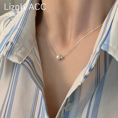 Изысканное минималистское жемчужное ожерелье 𫔀Женское 2024, новое нишевое ожерелье из титановой стали с ключицей, темпераментное универсальное женское ожерелье