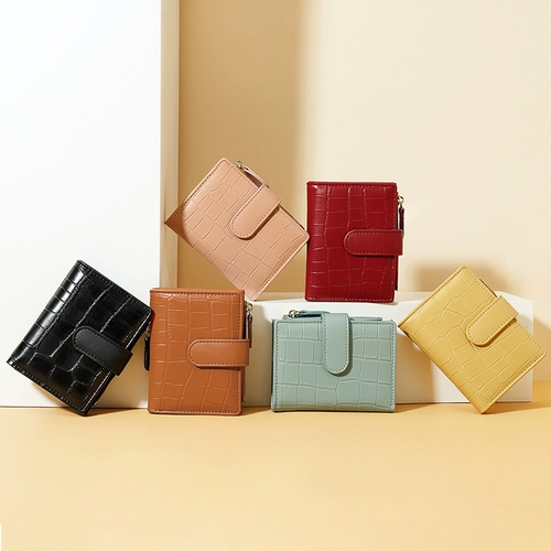 2025 Новый короткий клип женский нишевый дизайн модный простой ретро складной пряжкой студенческий ручной кошелек для монет