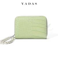 Кулон зеленой бусинки, выпущенный в тот же день