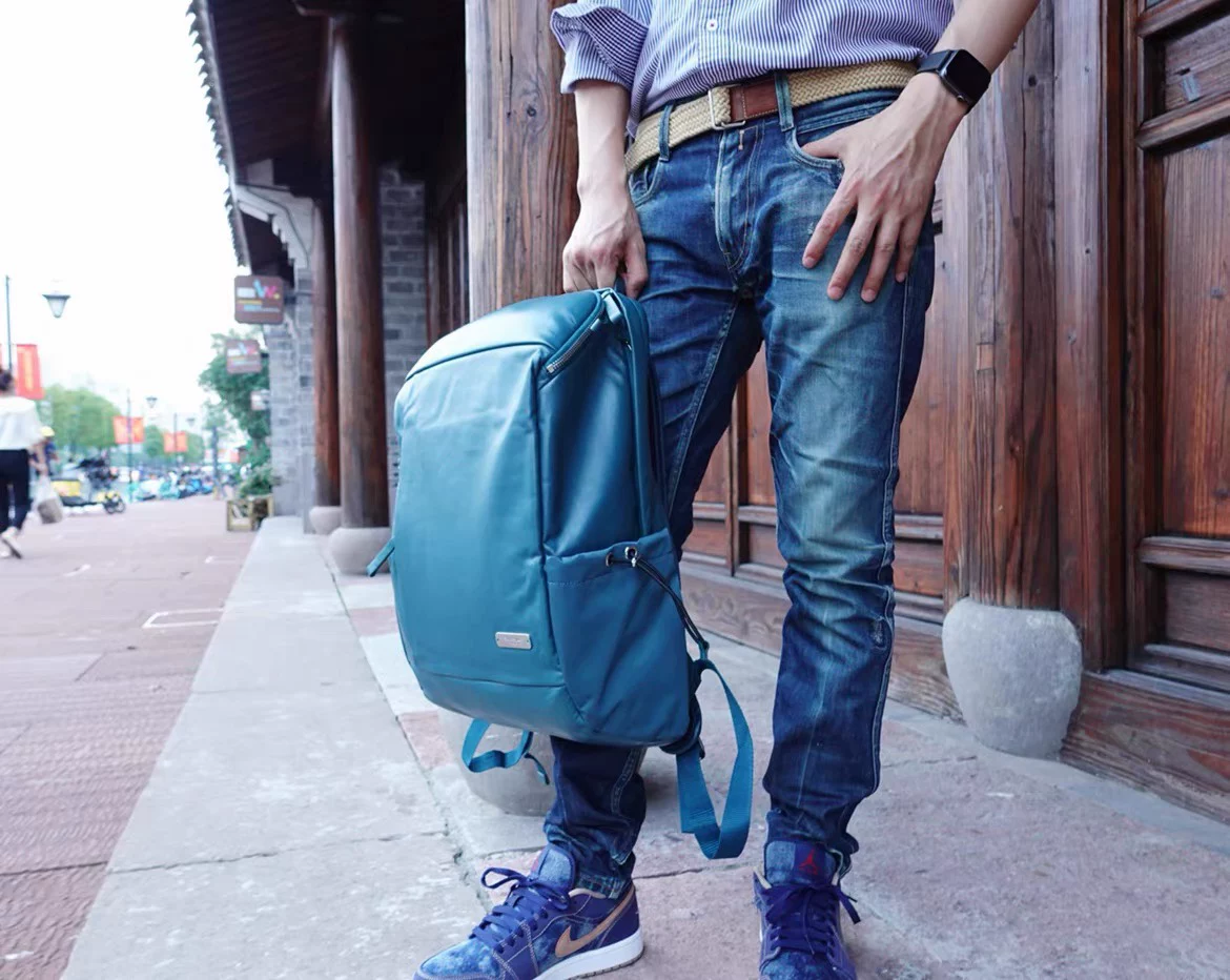Ultra light leather physiological warm jeans, capacious laptop, backpack