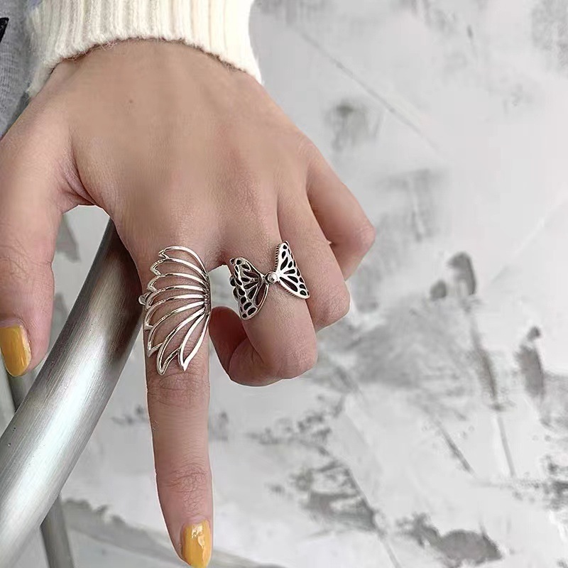 Tidal Little White S Silber einfacher hohler Linien-Schmetterlings-Millennium würziger modischer Nischenring für Mädchen_voghion.com