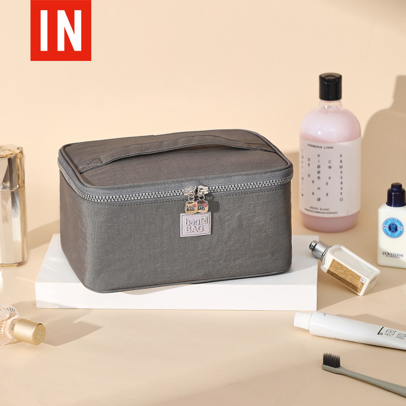 Cosmetics storage bag can be portable with travel large-capacity super-fire carry-on wash ins wind female high-end sense when going out