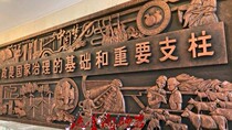Customized artificial sandstone relief background wall glass fiber reinforced plastic cement imitation copper sculpture party building anti-war cultural wall decoration