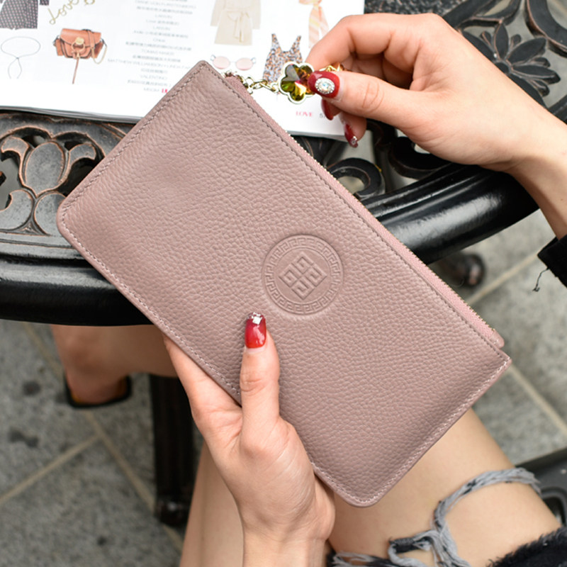2021 New zipper leather wallet women ultra-thin long version of large capacity cowhide mobile phone wallet simple hand bag tide