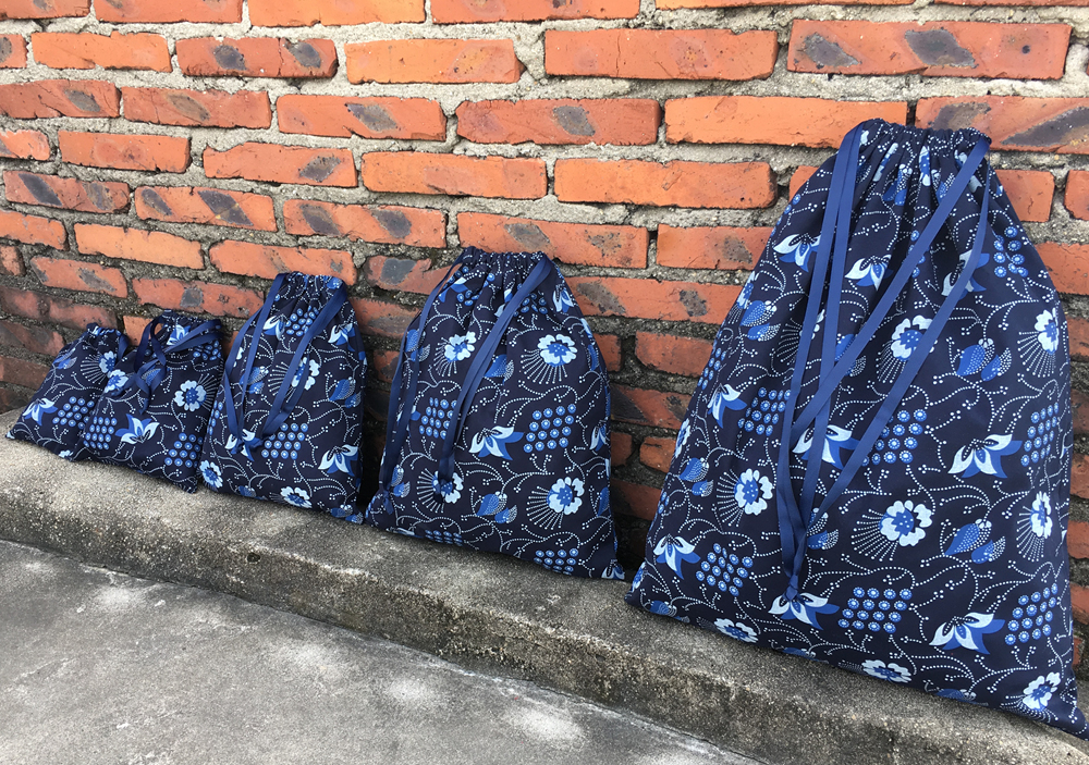 Japanese style and wind cotton beam pocket double drawing bag debris classification bag travel clothing collection package