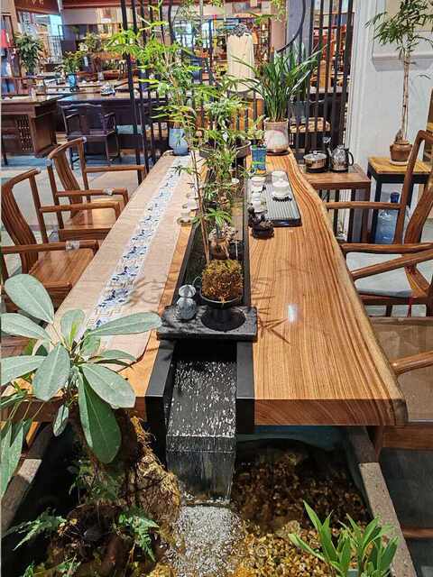 ການໄຫຼວຽນຂອງພູມສັນຖານນ້ໍາຊາຕາຕະລາງປະສົມປະສານຊາຕາຕະລາງການກະສິກໍາປາສ້າງສັນແບບຈີນແບບໃຫມ່ໄມ້ແຂງໂຄ້ງນ້ໍາໄຫຼຕາຕະລາງຈອກແລະເກົ້າອີ້ມຸມສາກ