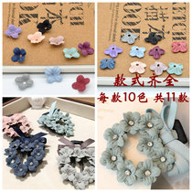 Ultra-fiber leather fabric embossed small four-petal flower piece Korean velvet hair accessories handmade DIY material