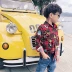 Sản phẩm mới 18 mùa thu đen siêu núm vú in váy kẻ sọc thủy triều mẹ và con gái mẹ và con trai áo len xà cạp kinh doanh quần áo trẻ em Áo sơ mi