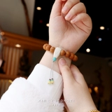 Баозен симпатическая слоновая кость, эванизируя бог -рисунок, три -пух