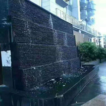 Running water background water curtain wall black stacked water courtyard balcony restaurant modern natural landscape fish pond hotel cultural stone