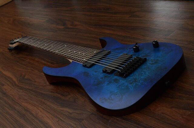 how do i string a guitar