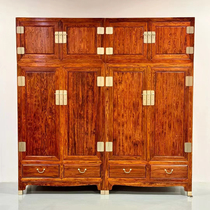 Armoire supérieure Hainan huanghuali unique et authentique avec peau de tigre motif paysage grimace yeux et motif X. Le prix dorigine est de 2 millions.