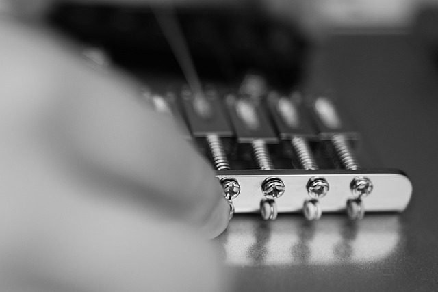 how to change guitar strings on an electric guitar