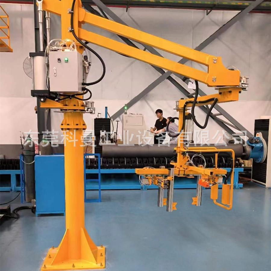 Power-assisted arm manipulator clamps and carries electrical chassis shells pneumatically controlled reversible rotating manipulator