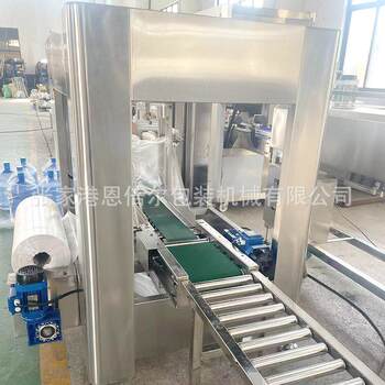 Manufacturer's automatic bagging and counting packaging machine produces moisture-proof large bottles of barreled water plastic film bagging machine