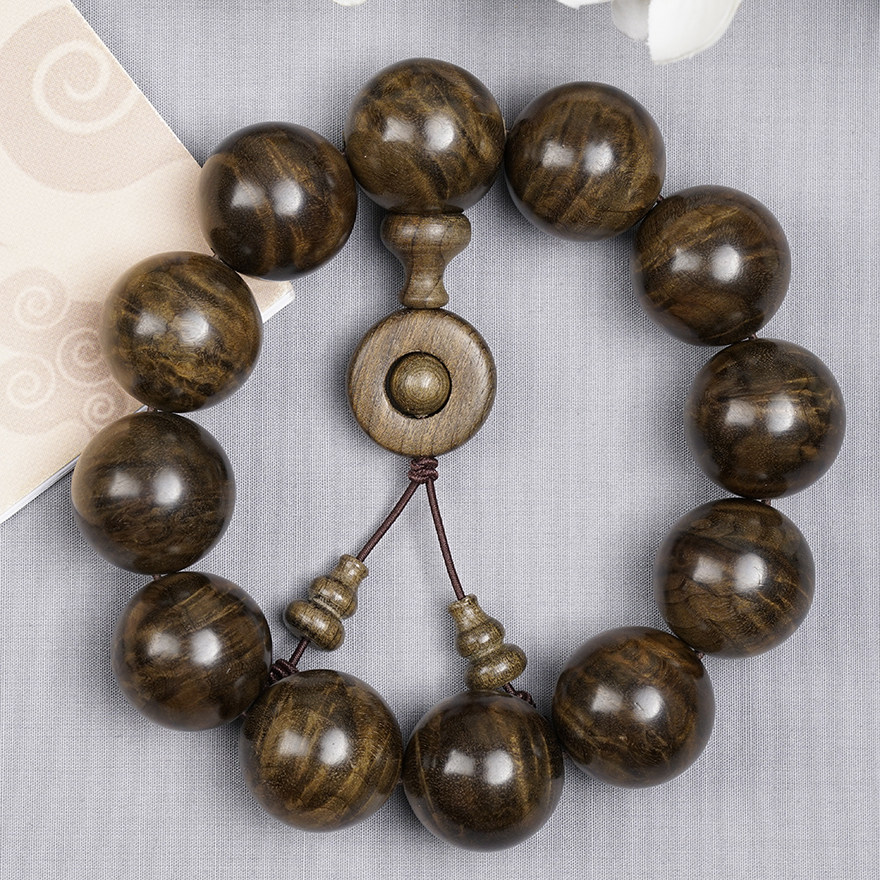 Boutique Gentian pattern gold silk Nan gloomy wood leaflet Zhennan 20mm Buddha bead bracelet