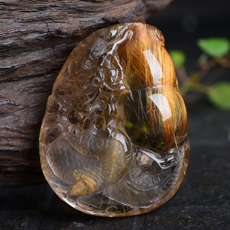 33 58g Natural Hair Crystal Finely Carved Dragon Pendant Good crystal and fine carving