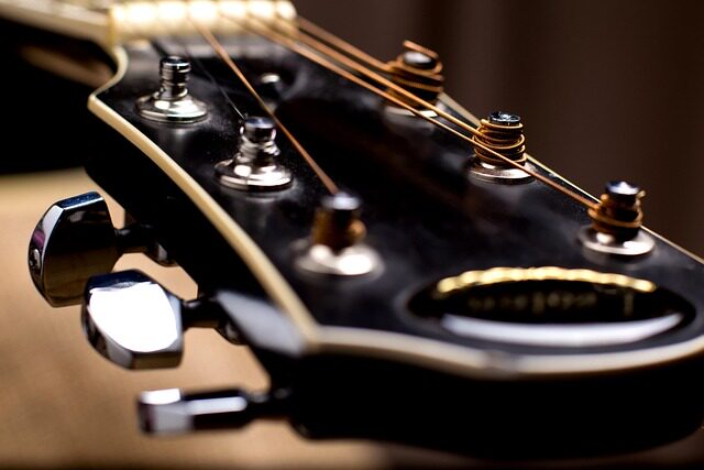how to put a strap on an acoustic guitar