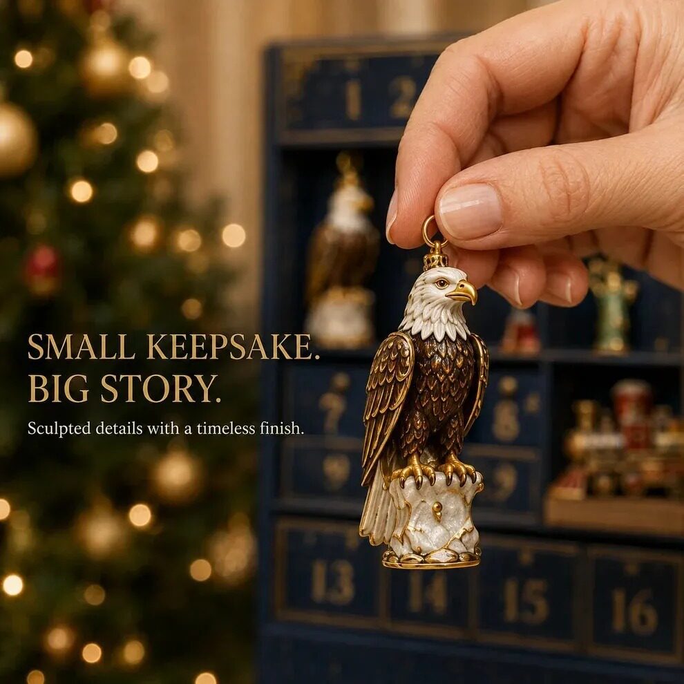 Close-up of a hand-finished bald eagle heritage ornament held in front of the advent calendar