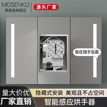 Hidden behind the bathroom mirror cabinet is an induction hand dryer a mobile phone soap dispenser and an embedded all-in-one hand dryer and tissue box.