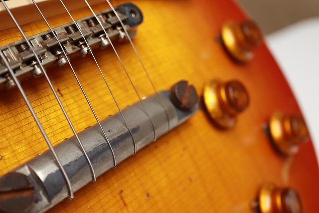 how do i tune my guitar without a tuner