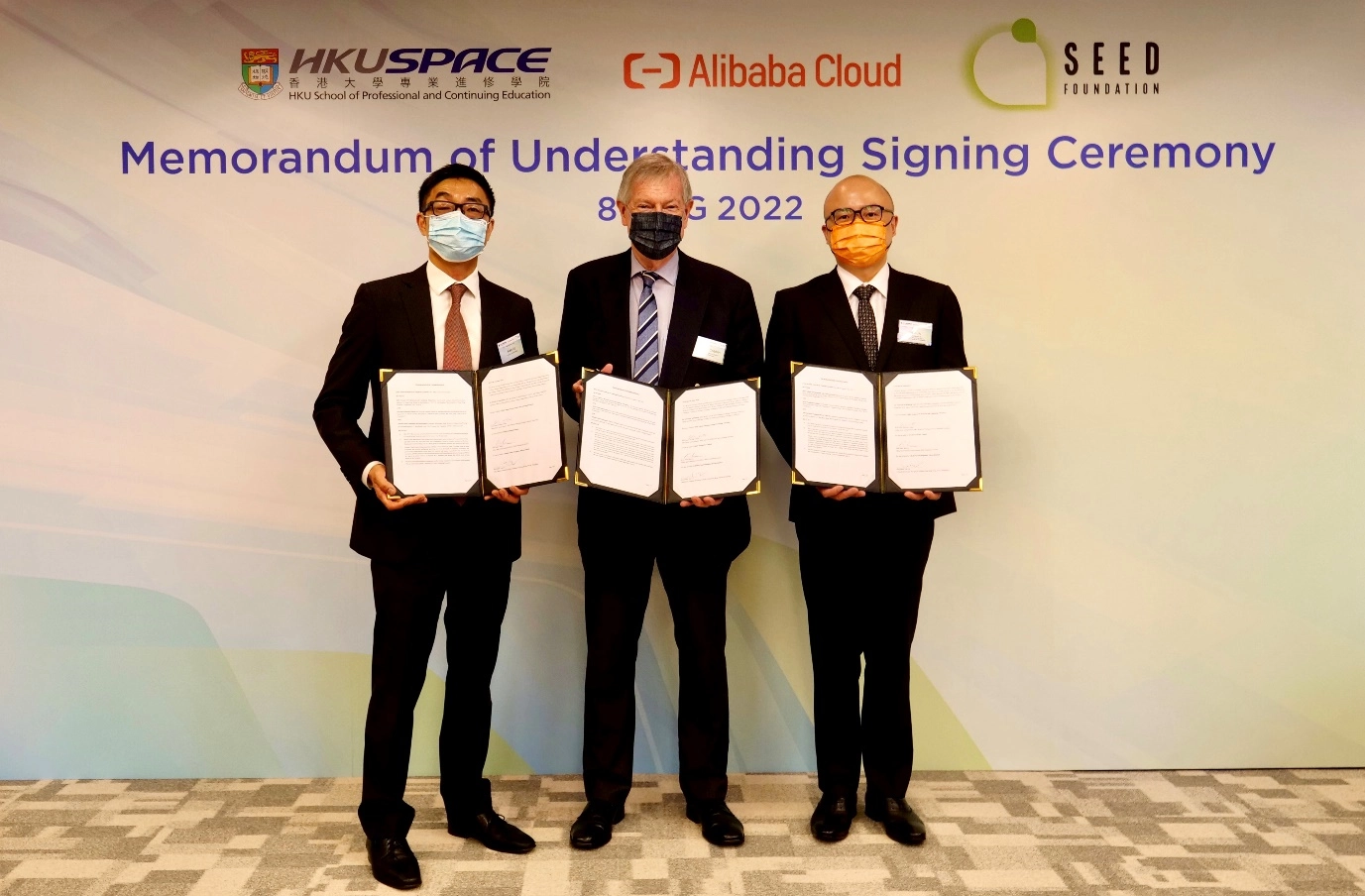 The MoU was signed by Dr John Cribbin, Deputy Director (Academic Services) of HKU SPACE (middle); Mr Leo Liu, General Manager of Hong Kong SAR, Macau SAR and Philippines, Alibaba Cloud Intelligence (right); and Mr Ken Lo, CEO of SEED Foundation (left).
