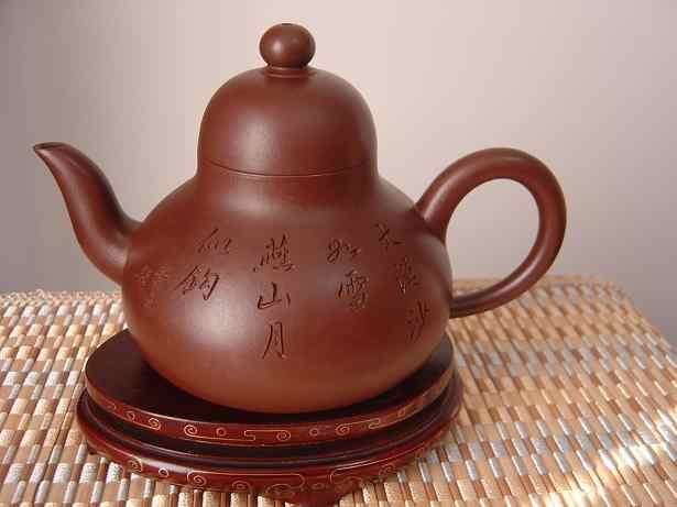 宜兴名家周桂珍紫砂壶作品《环龙鼎足壶》-淘壶人