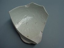 Yuanshufu kiln white glaze molded phoenix pattern bowl