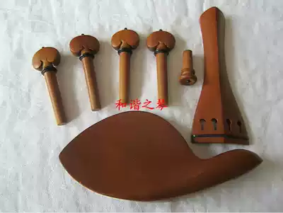 A set of violin jujube wood(inlaid with ebony)accessories, pull string board, string shaft, piano support, tail post