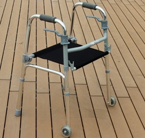 Foshan elderly folding walker with seat walker aluminum alloy crutch disabled person four-legged wheel