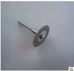 The electric grinder uses diamond cutting blades to cut various gem Jade Jade glass and other individual