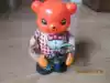 Nostalgic old tin bear photo toy